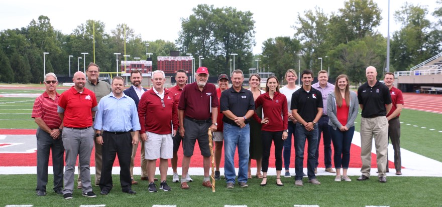 Varsity R Board members on Football Field